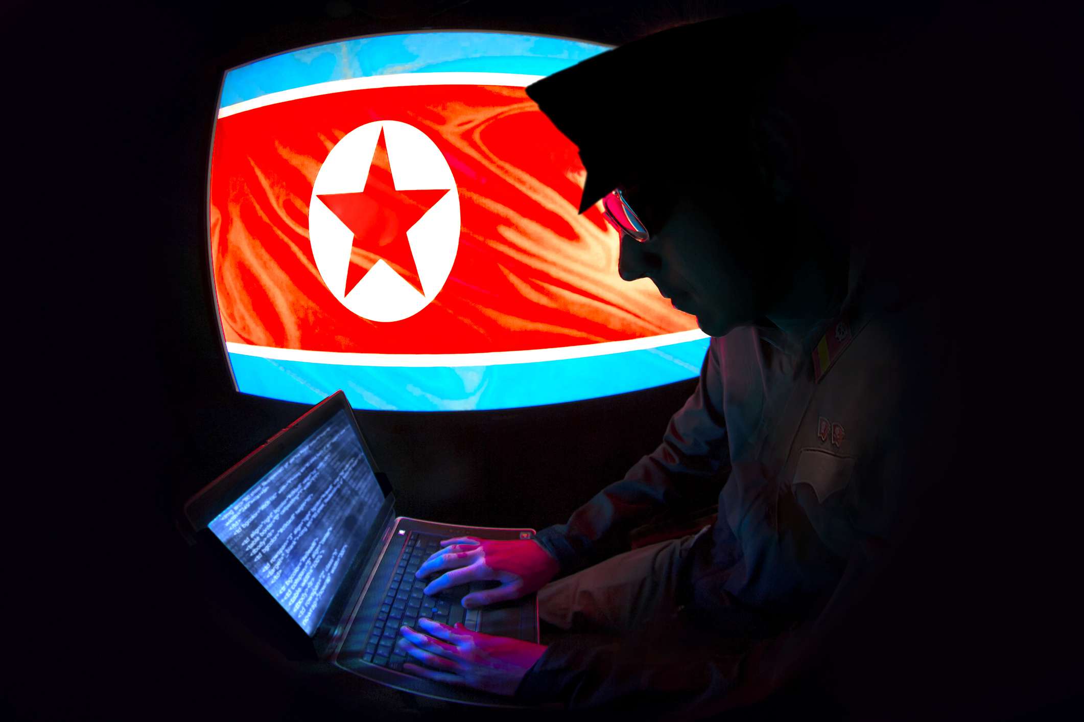 Severokorejská hackerská silueta se severokorejskou vlajkou