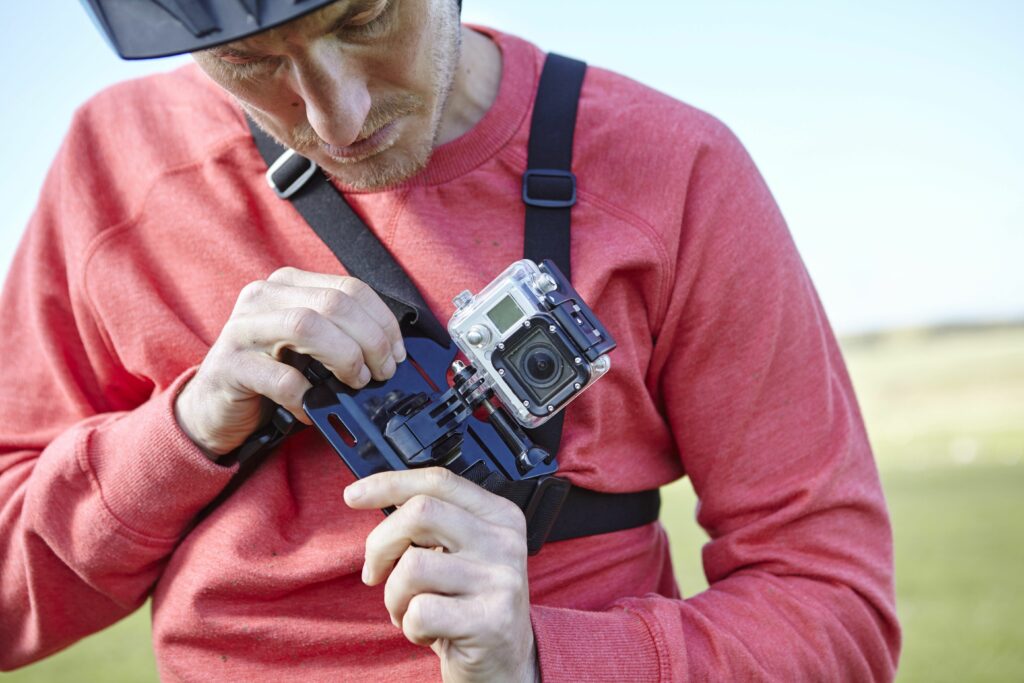 man attaching action camera to chest 664655587 5c8c2559c9e77c0001ac184b