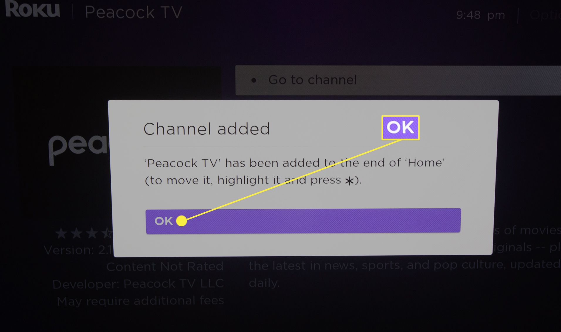 Zvýrazněné tlačítko OK potvrzující stažení aplikace Peacock v televizi Roku