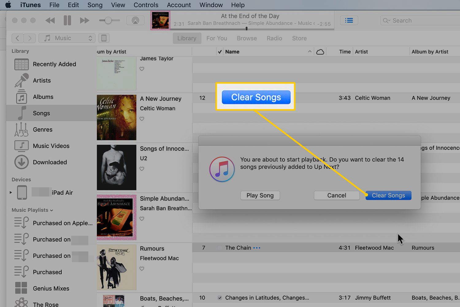 Tlačítko Vymazat skladby v dialogovém okně iTunes