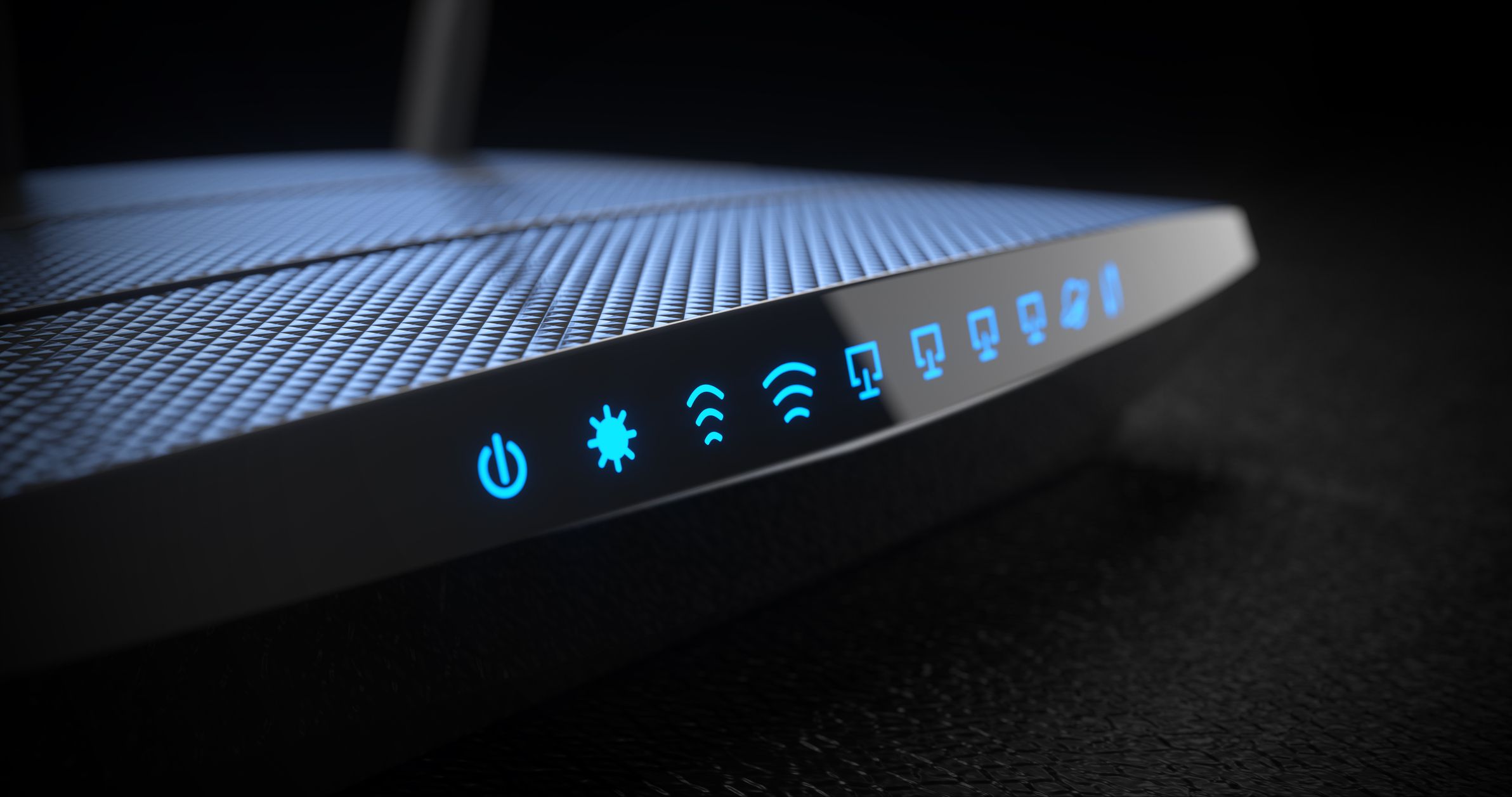 Bezdrátový internetový router Wi-Fi na tmavém pozadí