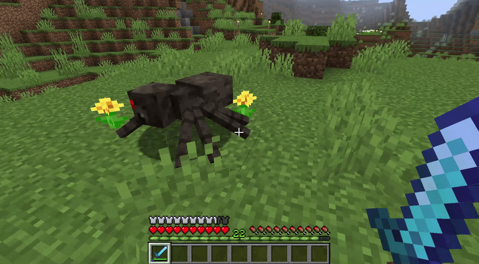 Screenshot pavouka v Minecraftu.