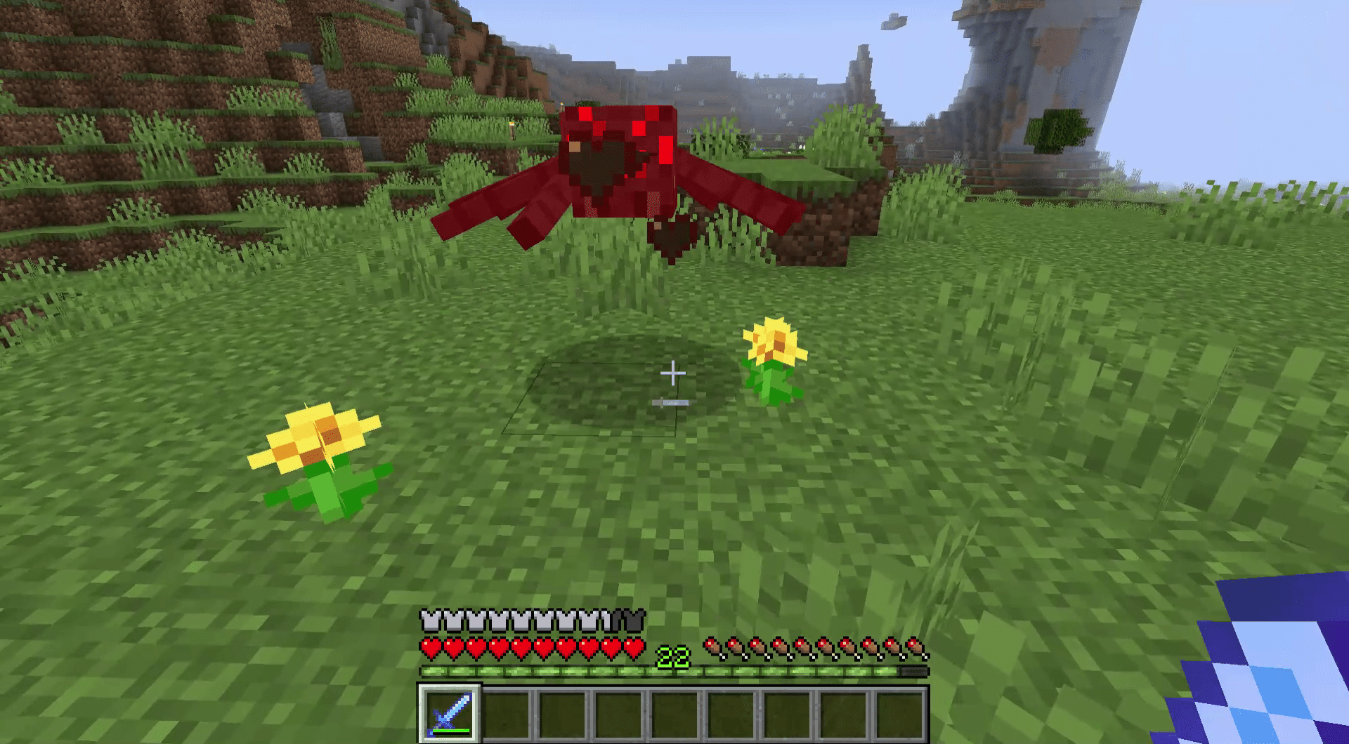 Screenshot z boje s pavoukem v Minecraftu.