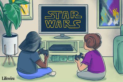 Dvě děti hrající videohru Star Wars na PlayStation 3, jedno má přilbu Darth Vader, druhé má vláskové vlásky princezny Leie