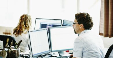 businessman working on computer in office 527951743 5b041270119fa800377b598e