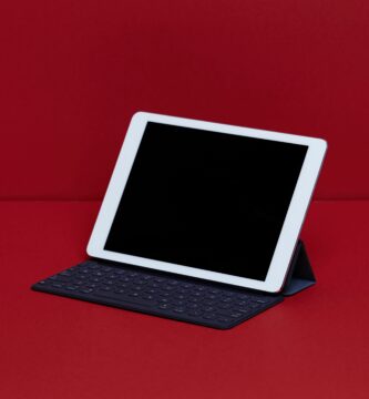 close up of digital tablet with keyboard on red table 910893214 5c64aa3d46e0fb0001dcd881