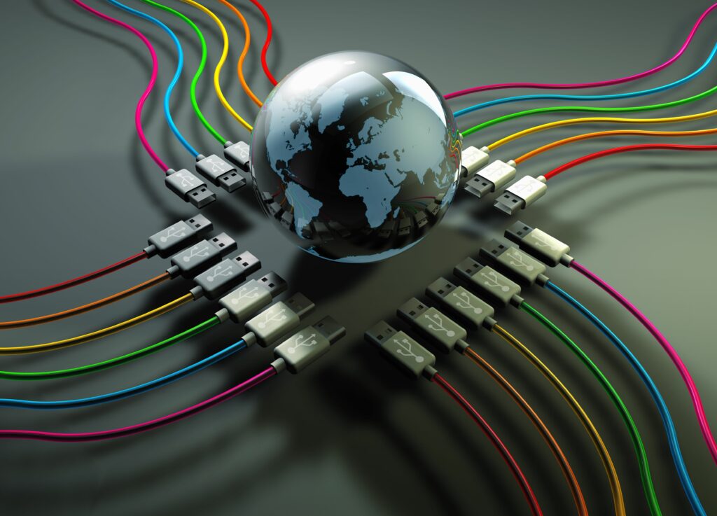 globe at center of multicolored usb cables 158317941 5b859cecc9e77c005084f552