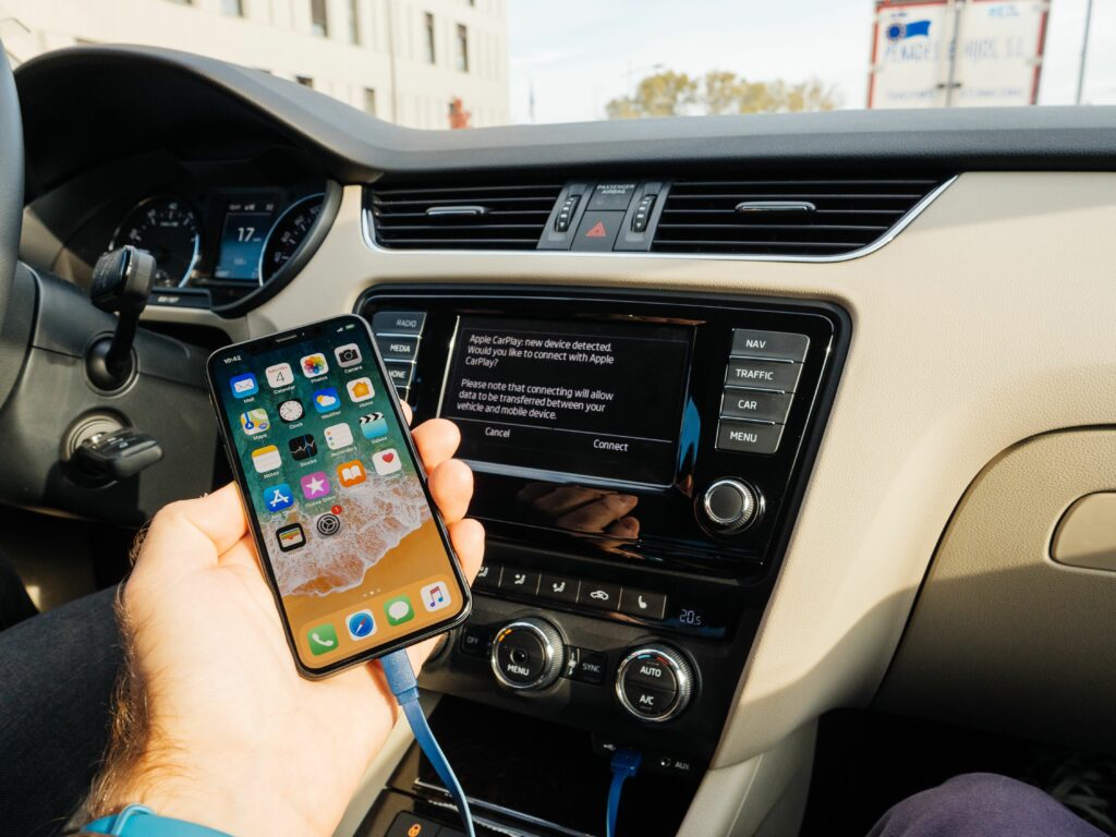 man connecting to apple carplay the new iphone x 10 by apple 881098140 5b5f538ac9e77c002c14289b