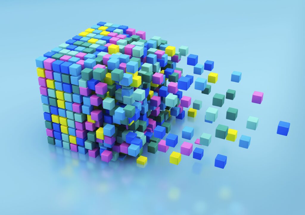 small multicolored blocks assembling in large cube shape on blue background 158318217 5ba2078446e0fb00503233da