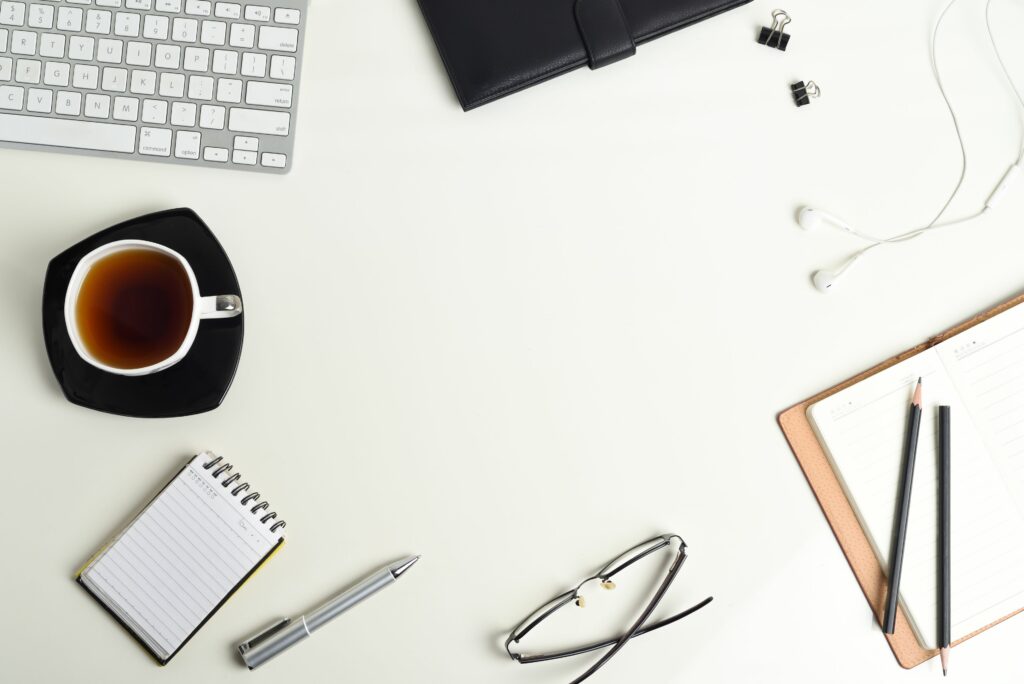 white office desk table with a lot of things on it top view with copy space 637047700 5a24617b4e46ba001a6d6d23