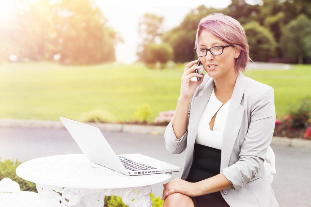 woman talking on phone outdoors 582745479 578e65535f9b584d202666ba