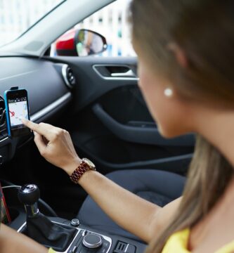 woman using smartphone as gps navigation in car 466592489 5b8b62b246e0fb0050d94fdb