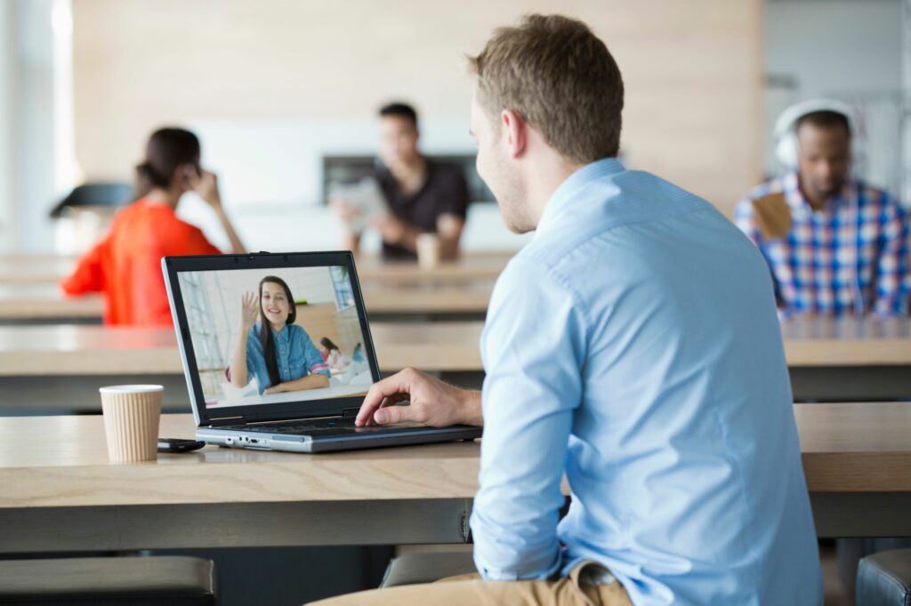 young man using laptop to have video call with girlfriend 151329140 5a8da05f119fa80037a61df7