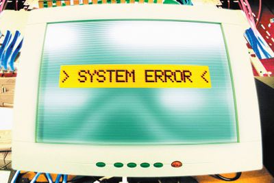Obrázek chybové zprávy počítače s chybou systému