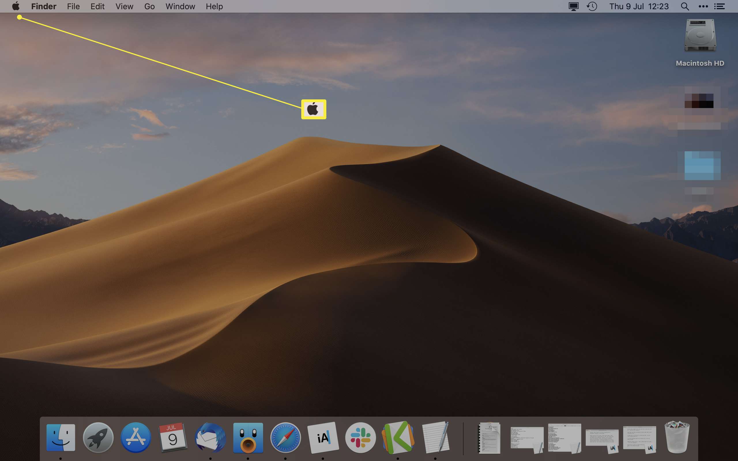 Plocha MacOS se zvýrazněnou ikonou Apple