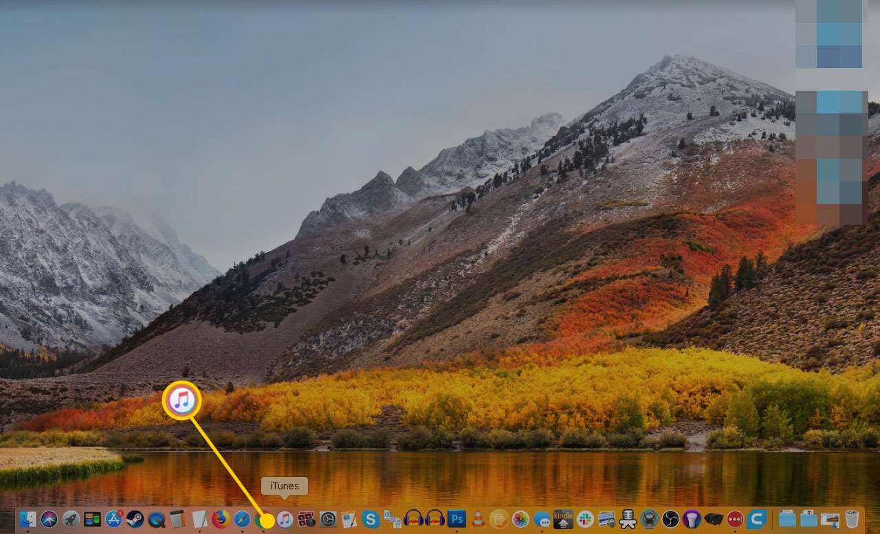 Plocha Mac se zvýrazněnou ikonou iTunes v Docku