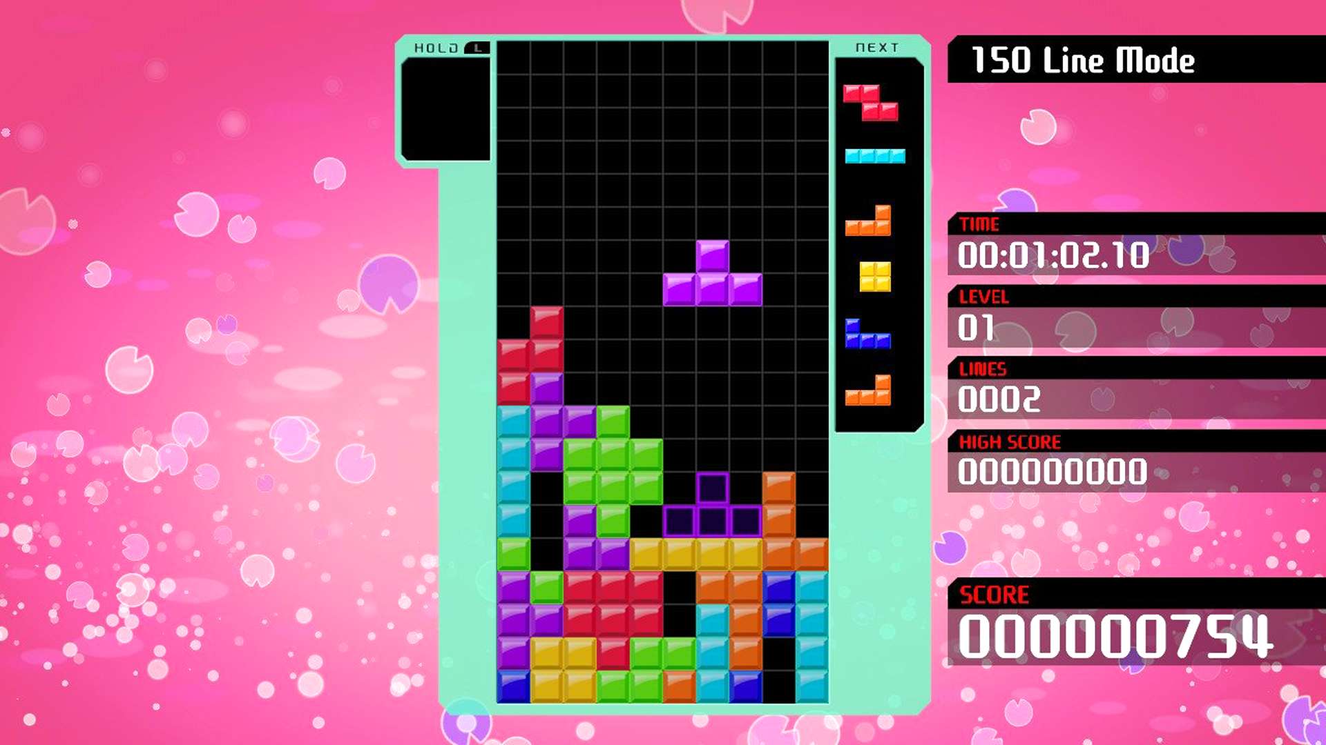 T-blok Tetromino v Tetris 99 na Nintendo Switch dělá T spin.