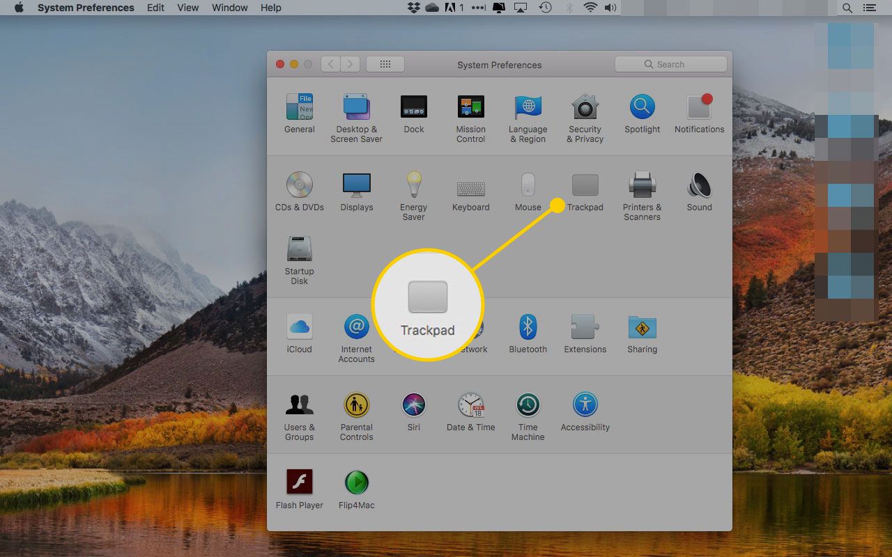 Předvolby systému Mac se zvýrazněnou částí Trackpad