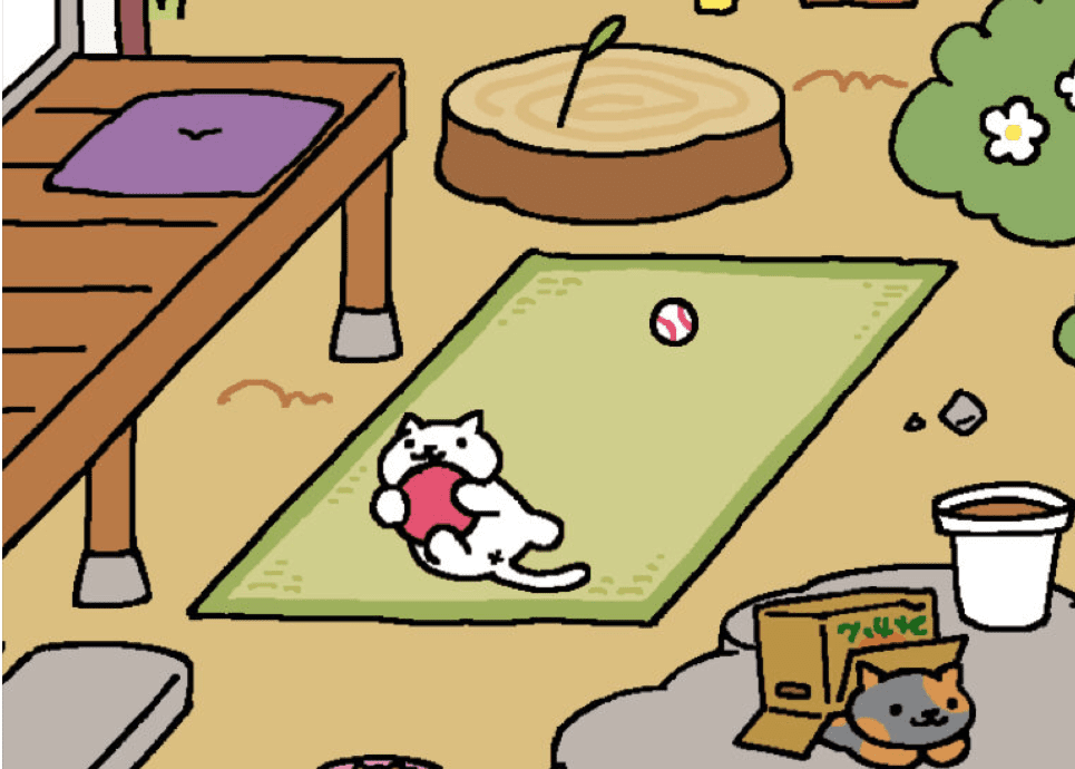 Hra Neko Atsume;  kočka drží míč