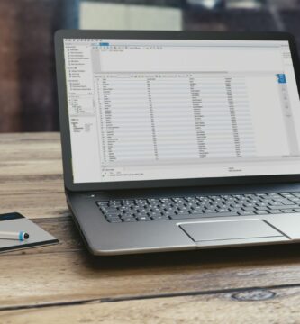 3518277PClaptoponwoodentable 45c9c9331804427bb083754ab8d52101