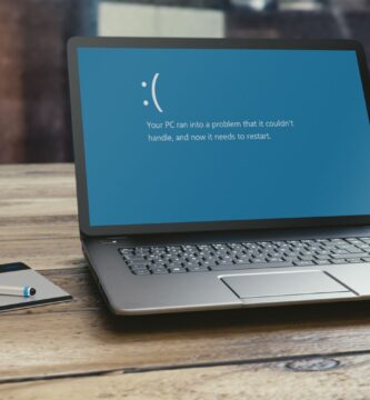 3518277PClaptoponwoodentable 95d640441ba2423db89e66b9cdc883a3