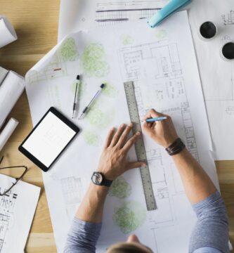Architect and Blueprints 568777595 56a4a15d5f9b58b7d0d7e633