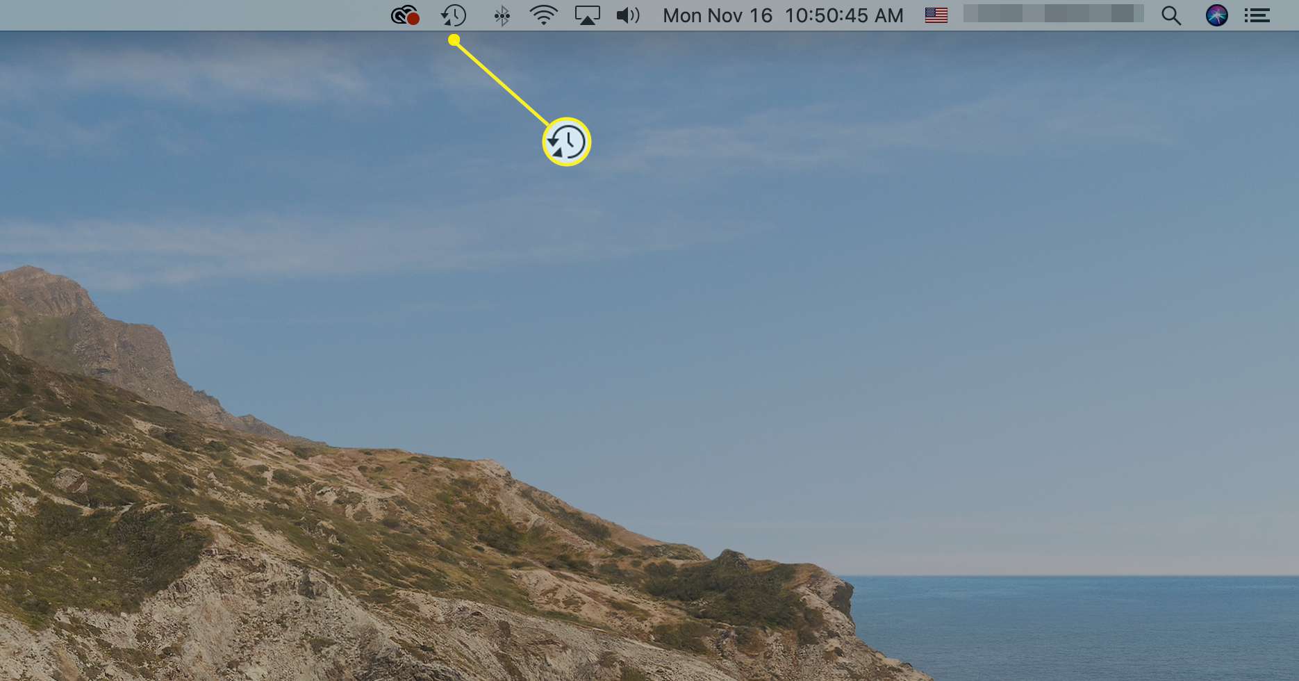 Na panelu nabídek systému Mac je zvýrazněna ikona Time Machine