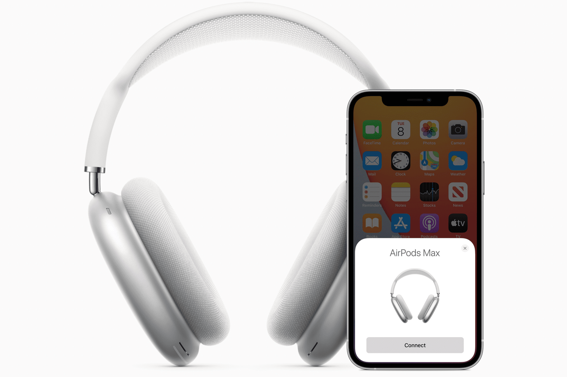 AirPods Max v bílé barvě vedle spárovaného iPhone