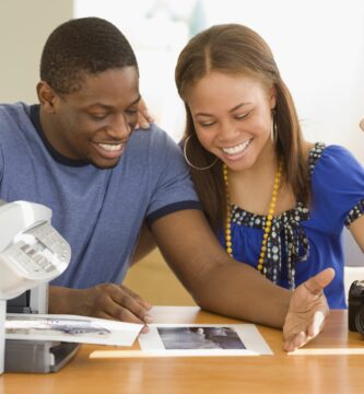 african couple printing out photographs 81714301 5a5a0f779802070037cb8439
