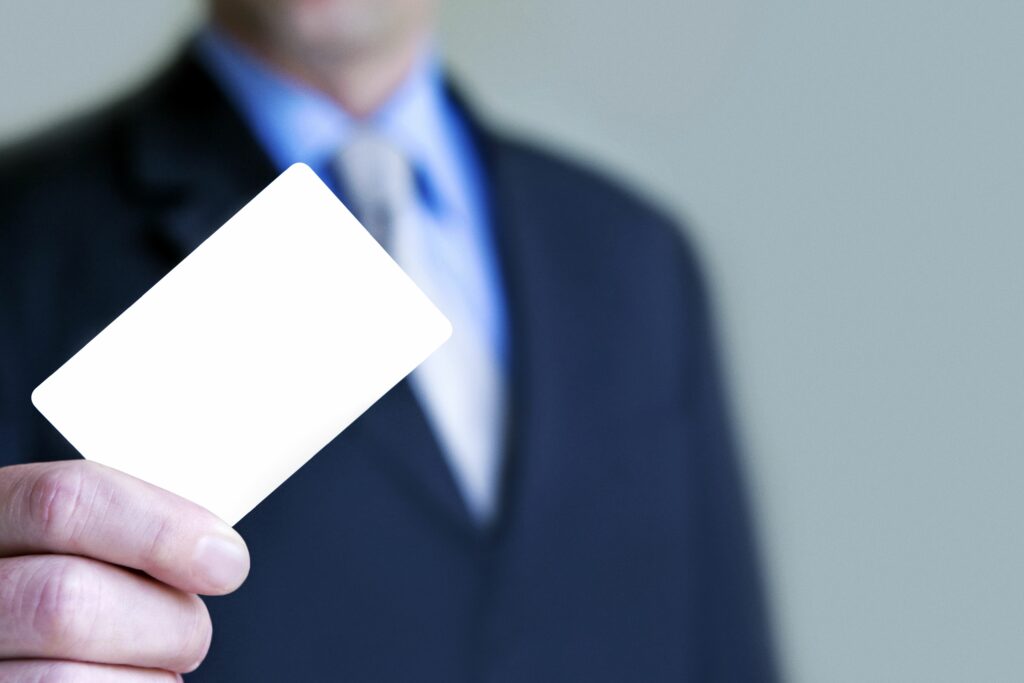 business man holding up blank business card 102626643 5a5e97940d327a0039660f67