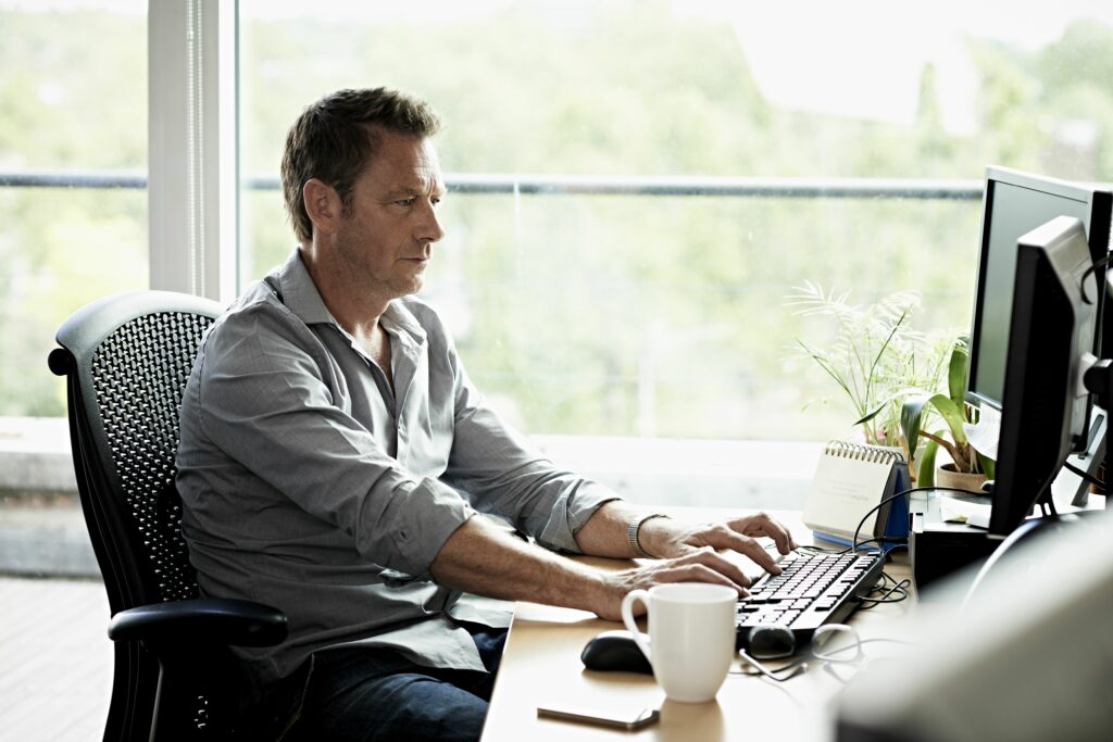 business man working on computer 475967873 57524b7f5f9b5892e8f26fc7