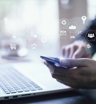 businessman working with laptop computer and digital tablet and smart phone in modern office with virtual icons interface 876409758 5b383e24c9e77c001a91531f