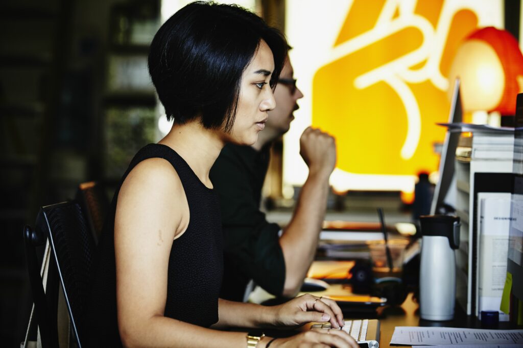 businesswoman at workstation of startup office 522517425 57e985d63df78c690f852264