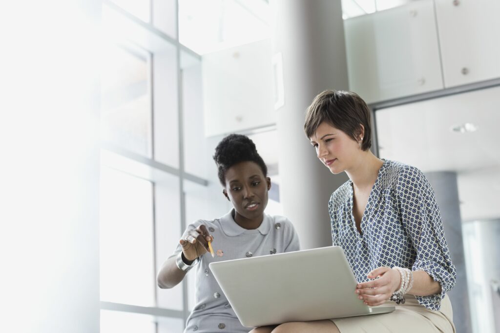 businesswomen with laptop working in office building 175138289 5a8de11204d1cf0036f74e20