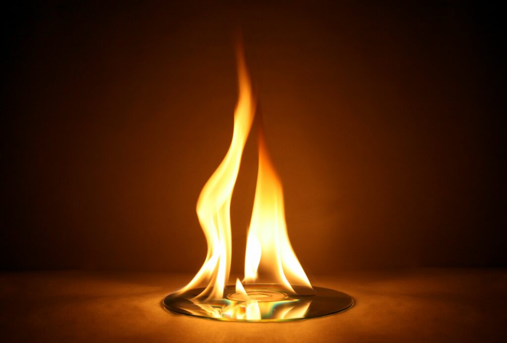 cd burning with large yellow flame 104049589 5b30f179fa6bcc00365ed606