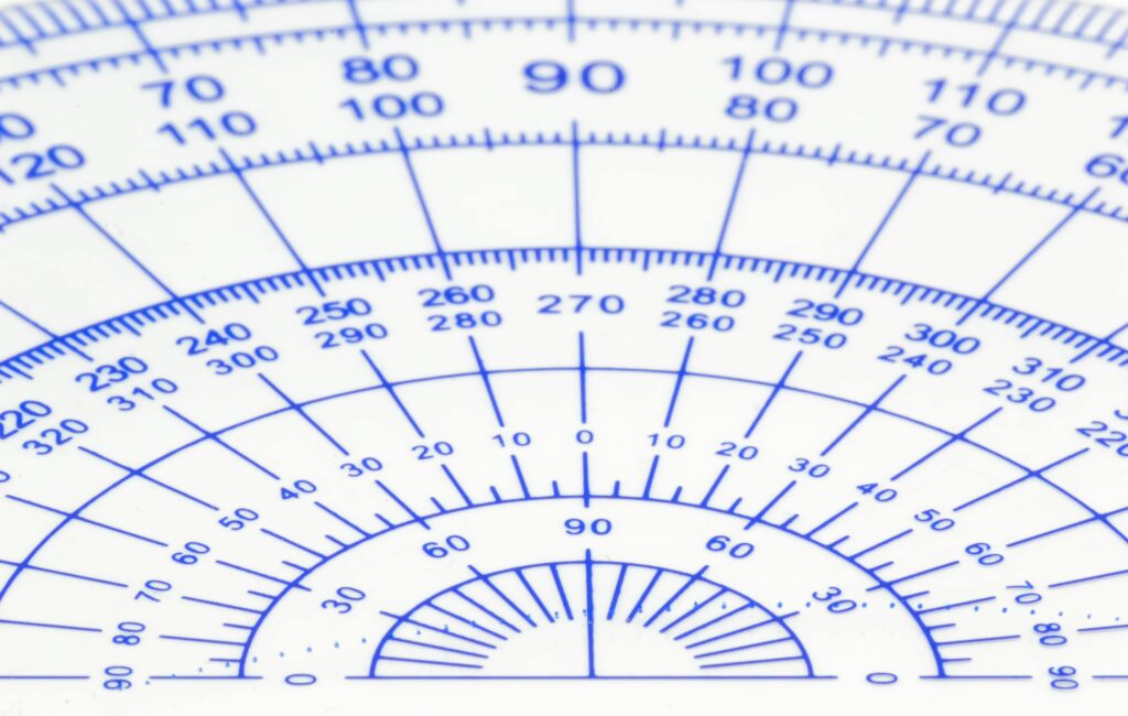 close up of protractor over white background 760304201 5be3761ec9e77c005154ac44