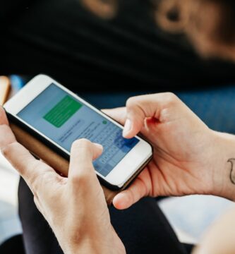 close up of woman messaging friends using smartphone 828485682 5b19a3c2ff1b780037050ed9