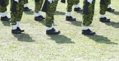 low section of military soldiers standing in field 561279041 5b3c4aeb46e0fb00379e5d77