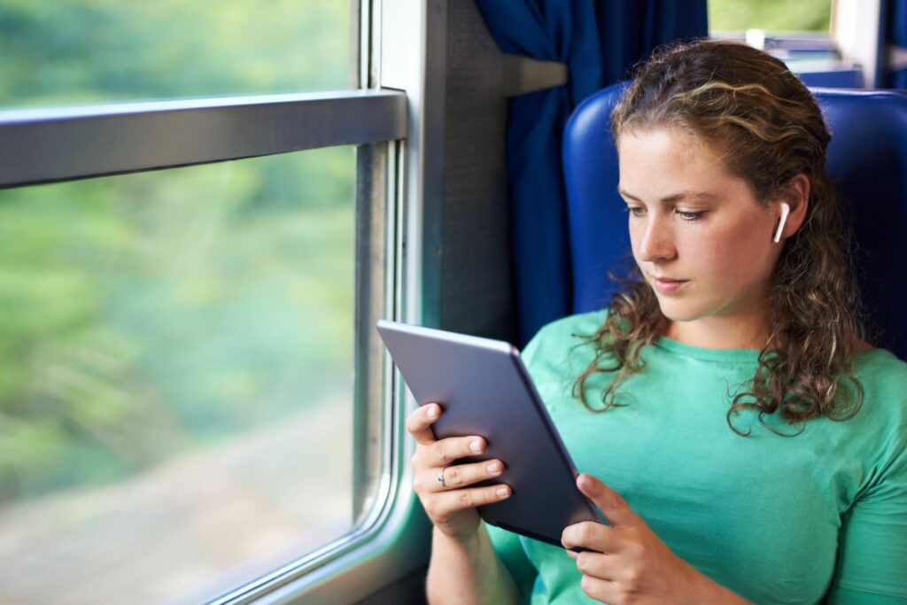 making the most of her morning commute with wireless entertainment 607916166 5b86eab746e0fb0025342a28 5c643295c9e77c000159ca9f