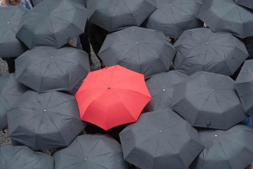 one red umbrella martin barraud ojo images getty images 56a6fa473df78cf772913d4b