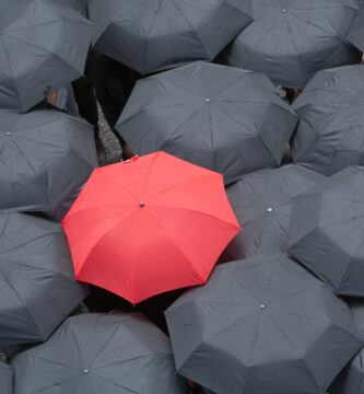 one red umbrella martin barraud ojo images getty images 56a6fa473df78cf772913d4b