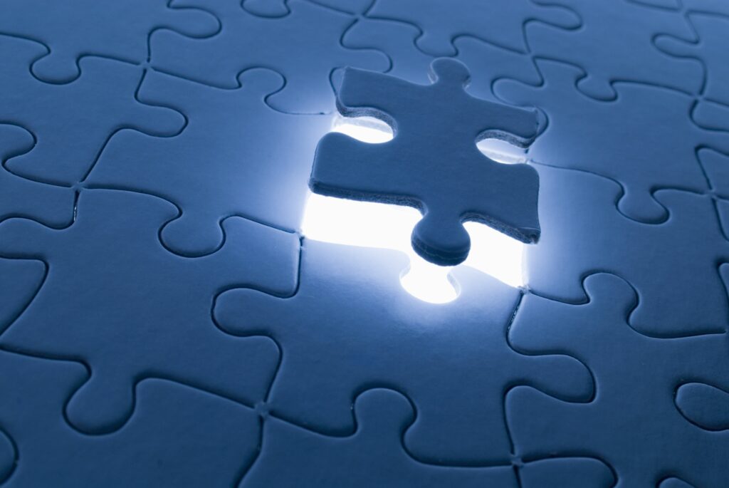 puzzle piece blue glowing pm images the image bank getty images 56a6faf55f9b58b7d0e5d215