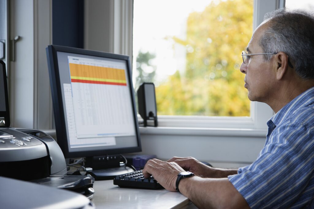 senior man using computer at home side view 200507722 001 5c23cc8746e0fb0001d22806