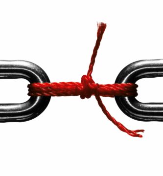 steel chain held together with red string 90418491 57b887d15f9b58cdfdafd126