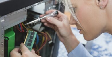 woman assembling random access memory at computer 668765353 5ac3cb95875db90037fd78fa 5c114d0a46e0fb0001ece5f4