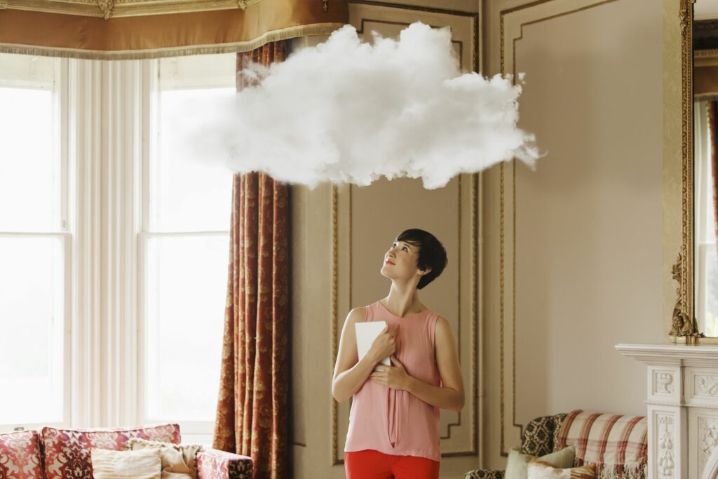 woman in living room looking at cloud above head 186666643 591caa255f9b58f4c0e0d5f6