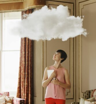 woman in living room looking at cloud above head 186666643 591caa255f9b58f4c0e0d5f6