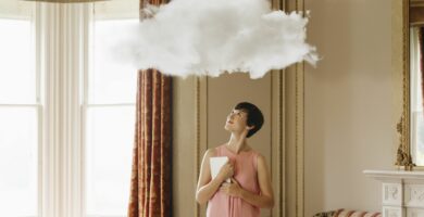 woman in living room looking at cloud above head 186666643 591caa255f9b58f4c0e0d5f6