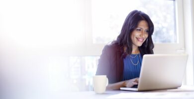 young business woman working on a laptop 528913607 5c16c611c9e77c00010b629b