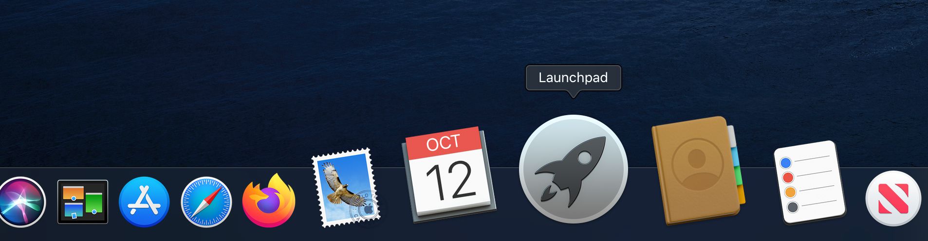Ikona Launchpadu v doku pro Macbook